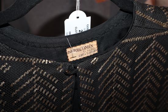 An Egyptian metal and net top and a black all-in-one trousers (2)